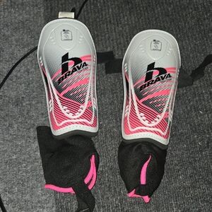Vibrant Pink and Black Sports Shin Guards for Performance
